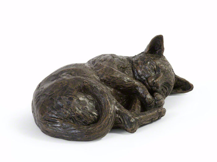 small cat urn resting cat