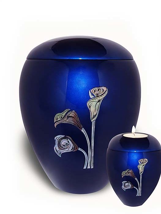 urn with wax light lilies